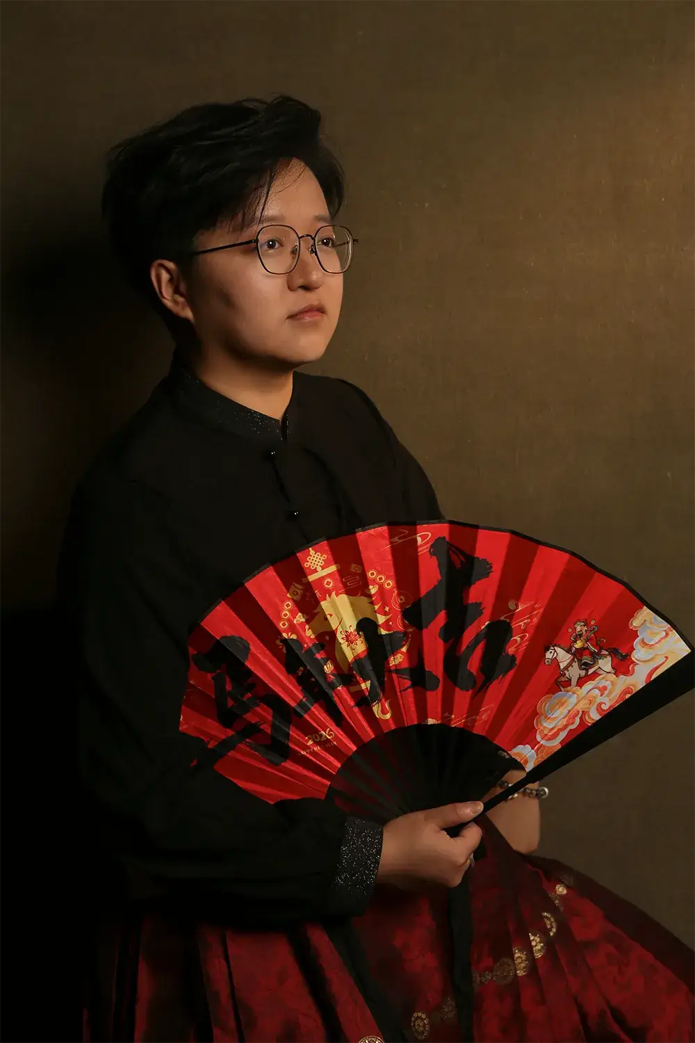 Founder of Tao Zenith wearing a traditional black Chinese shirt, representing authentic expertise in Chinese metaphysics and Feng Shui.